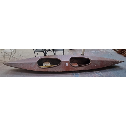 570 - A large wooden two-person kayak