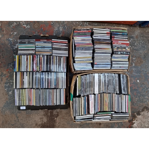 636 - Three boxes containing a collection of CDs - see images for titles