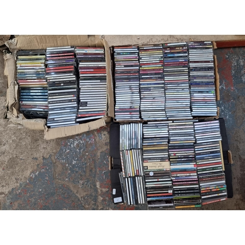 637 - Three boxes containing a collection of CDs - see images for titles