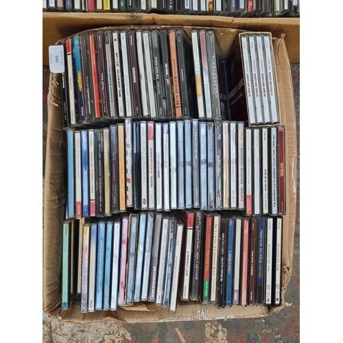 640 - Two boxes containing a collection of CDs - see images for titles