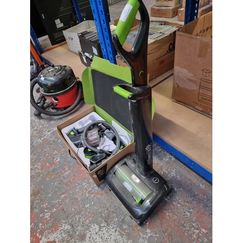 727 - Two Gtech bagless vacuum cleaners, one AirRam K9 upright and one boxed Multi K9 handheld