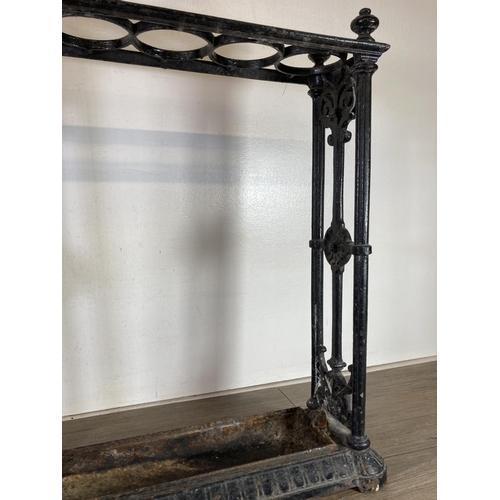 307 - A Victorian Coalbrookdale cast iron six section stick stand, with original drip tray, impressed kite... 