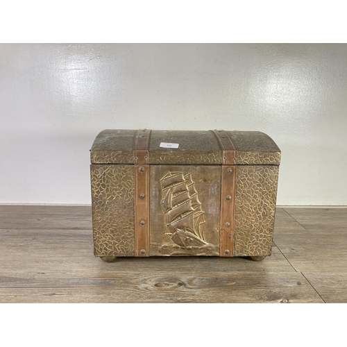 310 - A mid 20th century embossed brass and copper nautical design dome top coal box - approx. 28cm high x... 