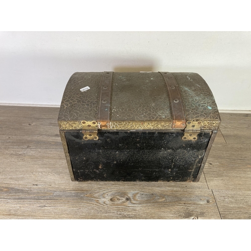 310 - A mid 20th century embossed brass and copper nautical design dome top coal box - approx. 28cm high x... 