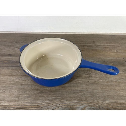 313 - Three pieces of Le Creuset kitchenware, one green glazed stoneware No. 23 casserole dish, one blue e... 