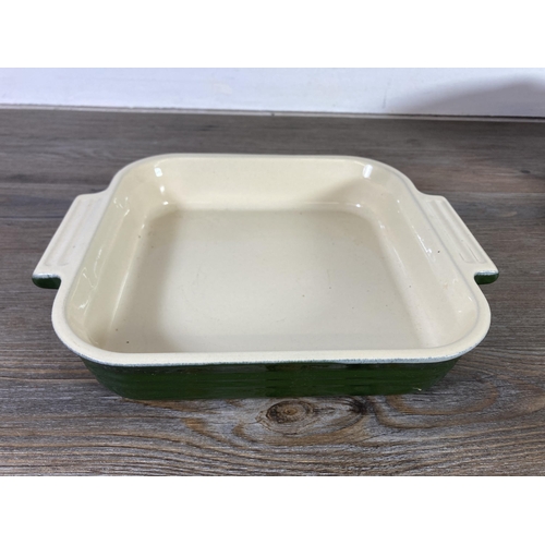 313 - Three pieces of Le Creuset kitchenware, one green glazed stoneware No. 23 casserole dish, one blue e... 