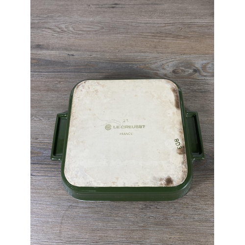 313 - Three pieces of Le Creuset kitchenware, one green glazed stoneware No. 23 casserole dish, one blue e... 