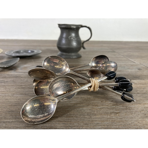 315 - Sixteen pieces of antique and vintage metalware to include twelve EPNS coffee bean spoons, Tudric pe... 