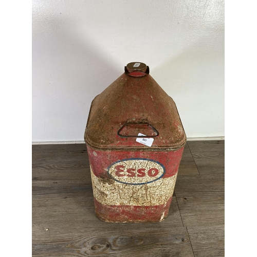 327 - A vintage Esso red metal 5 gallon oil can - approx. 49cm high