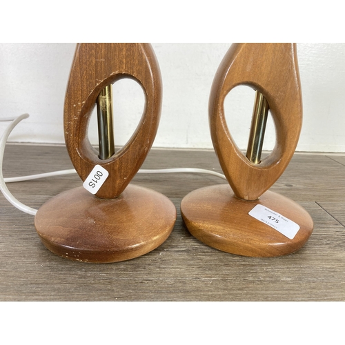 475 - A pair of mid 20th century teak table lamps - approx. 30cm high