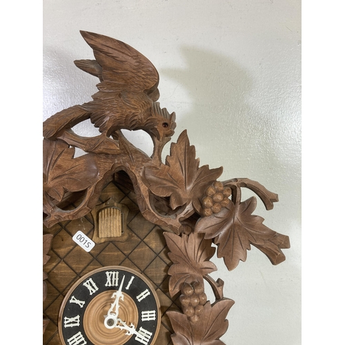 482 - A German Regula carved wood cuckoo clock - approx. 50cm high