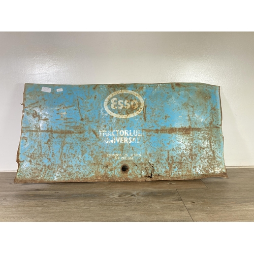 488A - A vintage Esso enamel sign which was previously part of an oil drum - approx. 86cm wide x 43cm high