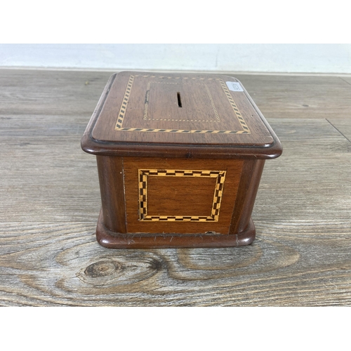 490 - An early 20th century inlaid mahogany money box - approx. 9cm high x 16cm wide x 13cm deep