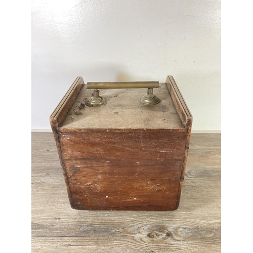 497 - An Edwardian mahogany and brass coal scuttle - approx. 32cm high x 28cm wide x 39cm deep