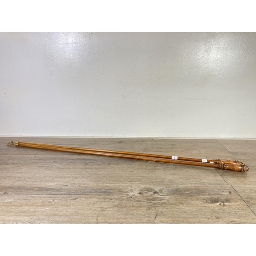 499 - A pair of vintage wooden curtain draw poles - approx. 102cm long