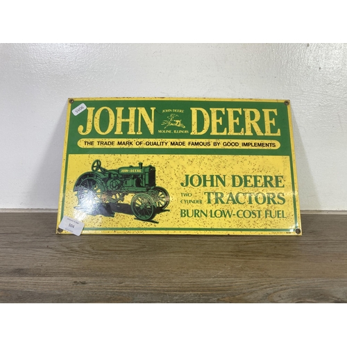 504 - A 1995 John Deere enamel sign - approx. 39cm wide x 23.5cm high