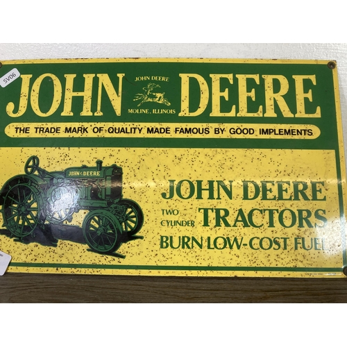 504 - A 1995 John Deere enamel sign - approx. 39cm wide x 23.5cm high