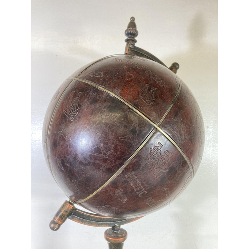 510 - A 19th century style faux leather floor standing globe - approx. 75cm high