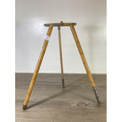 518 - A vintage bamboo effect metal folding walking/seat stick - approx. 89cm long