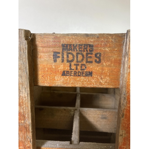 523 - A mid 20th century Tizer Ltd painted pine six section bottle crate - approx. 34cm high x 37cm wide x... 