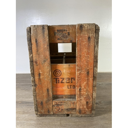 523 - A mid 20th century Tizer Ltd painted pine six section bottle crate - approx. 34cm high x 37cm wide x... 