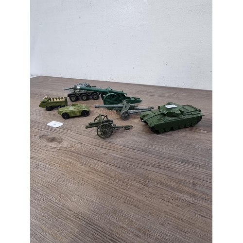 346 - Seven military toys to include Britains Ltd., Dinky anti-tank gun, Dinky Supertoys Centurion tank, M... 