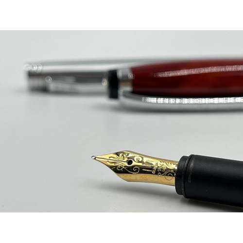 1173 - Four writing instruments to include Burnham fountain pen with 14ct gold nib, Mont Blanc ballpoint pe... 