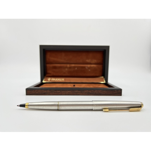 1175 - Two boxed ballpoint pens, one brushed steel Parker and one Sheaffer