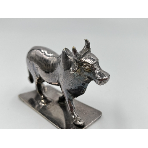 1313 - A white metal model of a buffalo - approx. gross weight 156 grams and 6cm high x 8cm long x 3cm wide