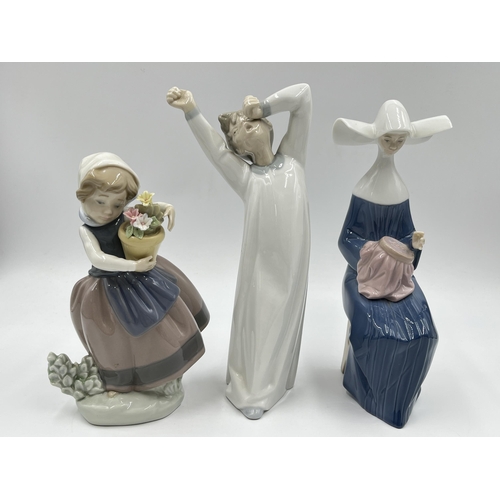 172 - Three Lladro figurines to include 5501 Time To Sew etc.