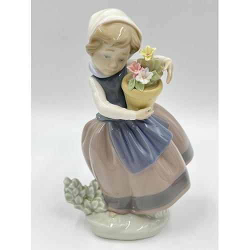 172 - Three Lladro figurines to include 5501 Time To Sew etc.