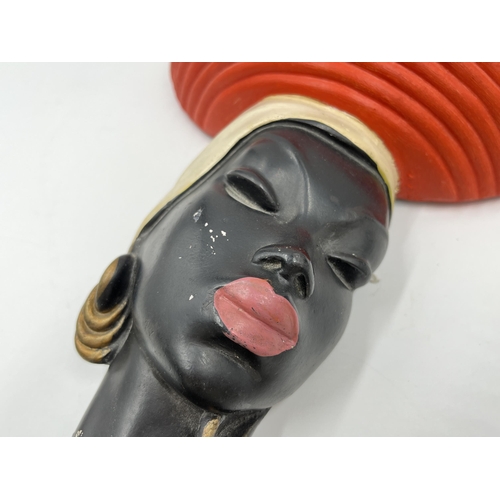 178 - A Bossons style African female pottery wall mask