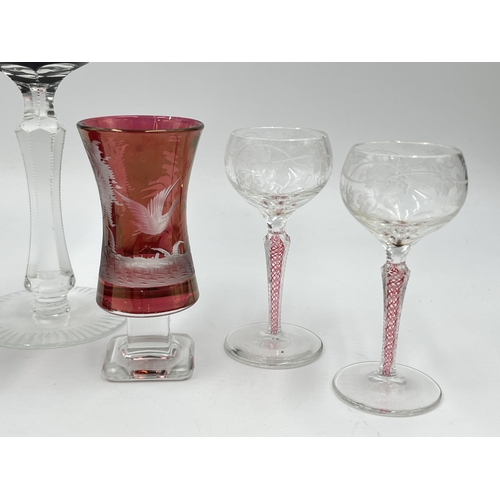 227 - Five pieces of cranberry glassware - largest approx. 18cm high