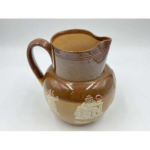 229 - A Doulton Lambeth 6858 stoneware jug - approx. 15cm high