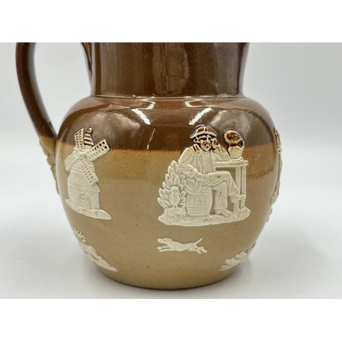 229 - A Doulton Lambeth 6858 stoneware jug - approx. 15cm high