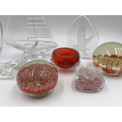 236 - Seven pieces of studio glass to include Isle of Wight heart shaped paperweight, J G Durand sailboat ... 