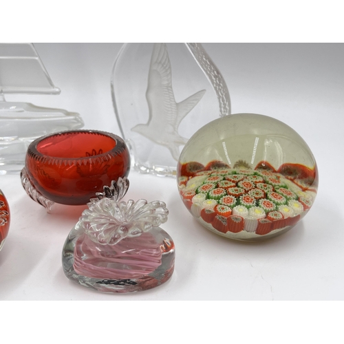 236 - Seven pieces of studio glass to include Isle of Wight heart shaped paperweight, J G Durand sailboat ... 