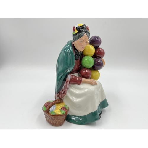 241 - A Royal Doulton The Old Balloon Seller HN 1315 figurine