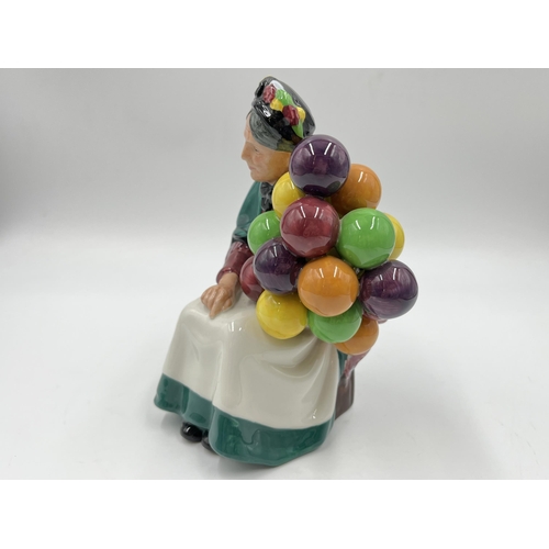 241 - A Royal Doulton The Old Balloon Seller HN 1315 figurine