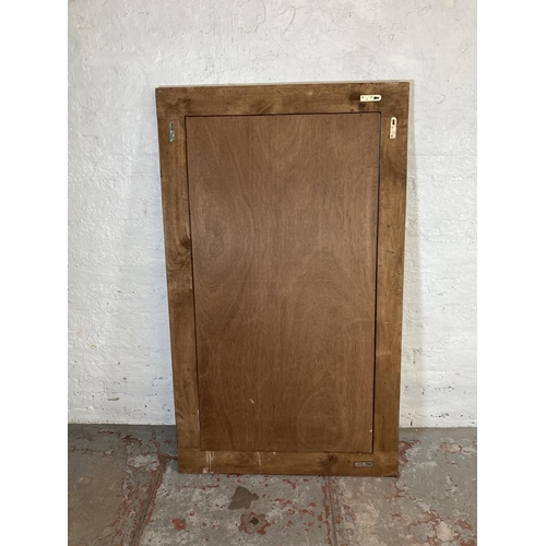 149C - A large modern carved teak framed wall mirror - approx. 160cm x 95cm