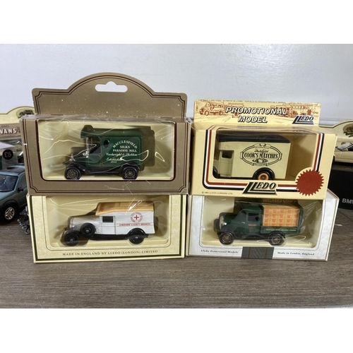 394 - A collection of toys to include boxed B.M.W. 3 Series convertible, boxed NZG Christian Salversen lor... 