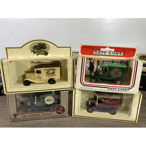 394 - A collection of toys to include boxed B.M.W. 3 Series convertible, boxed NZG Christian Salversen lor... 