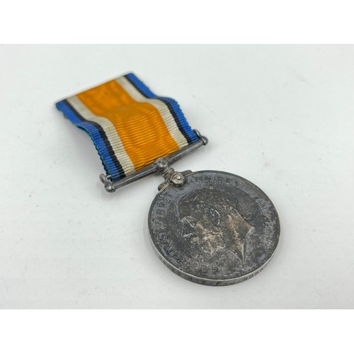 1159B - A WWI medal pair presented to 24295 PTE F.J Robbins Royal Warwickshire