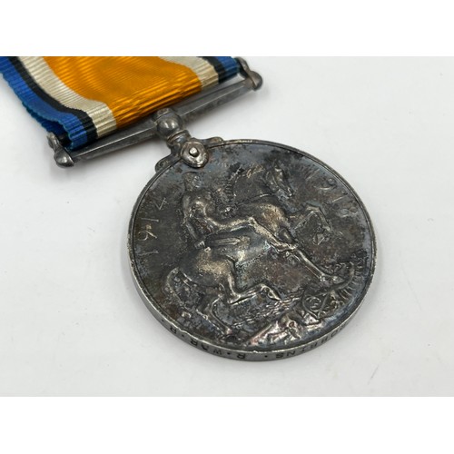 1159B - A WWI medal pair presented to 24295 PTE F.J Robbins Royal Warwickshire