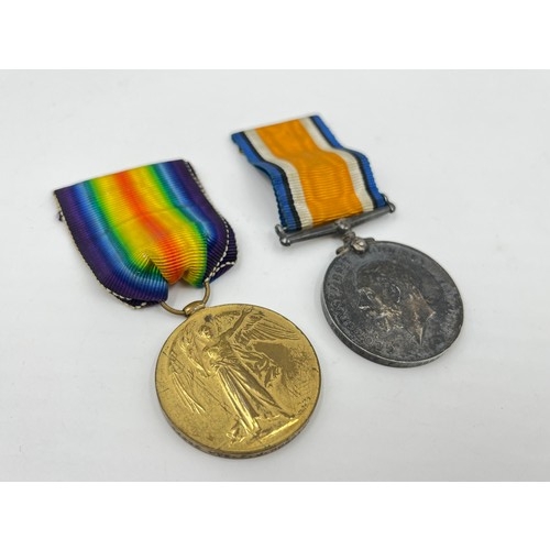 1159B - A WWI medal pair presented to 24295 PTE F.J Robbins Royal Warwickshire