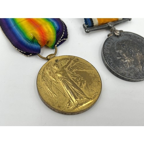 1159B - A WWI medal pair presented to 24295 PTE F.J Robbins Royal Warwickshire