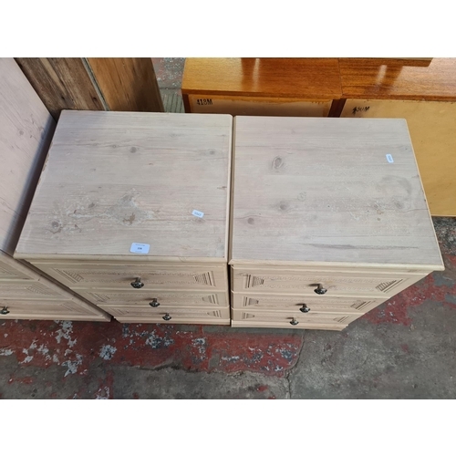 104 - A pair of Alstons Furniture pine effect bedside chests of three drawers - approx. 77cm high x 46cm w... 