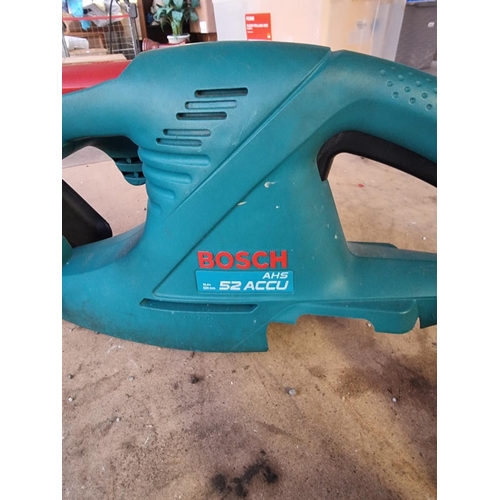 557 - A Bosch AHS52ACCU cordless hedge trimmer with two batteries and charger