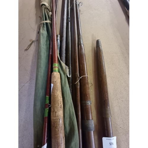 576 - A collection of antique and vintage fishing rods to include Arrowsmith mahogany etc.