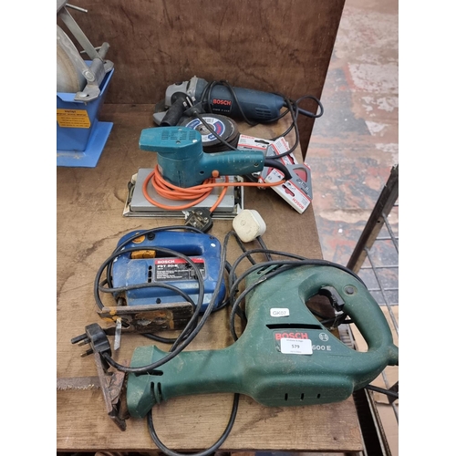 579 - Four 240v power tools, two Bosch saws, one Black & Decker sander and one Bosch angle grinder